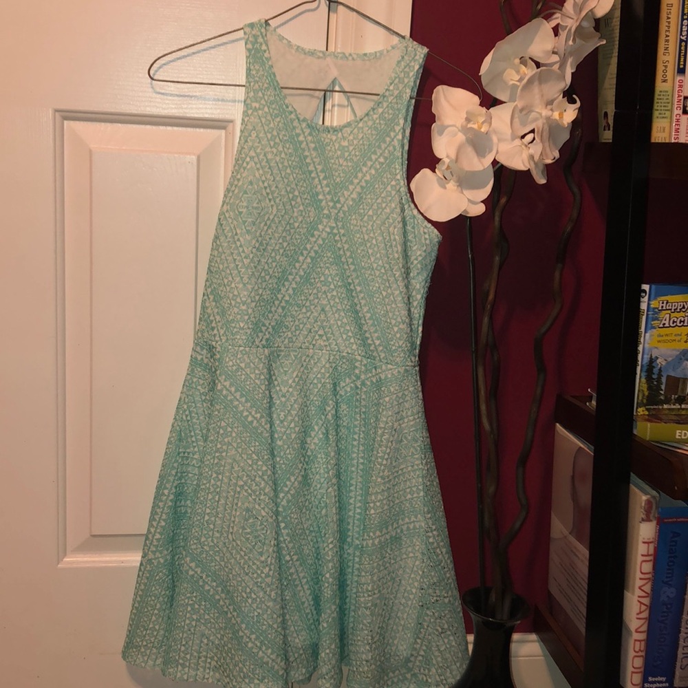 Turquoise dress with white detail